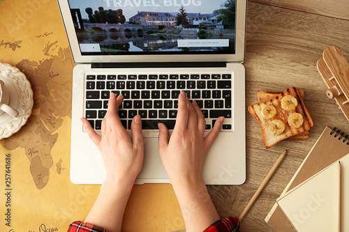 Female blogger working with...