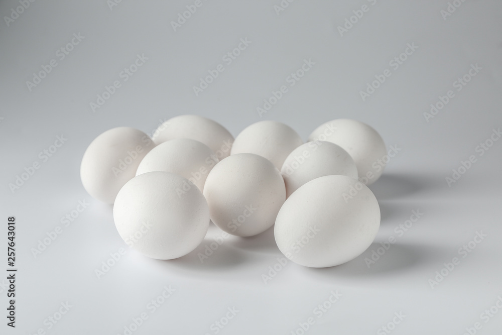 Tasty raw eggs on white background Tasty raw eggs on white background