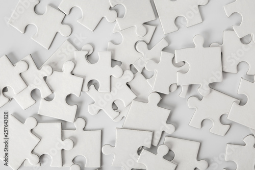 Heap of white puzzle pieces...