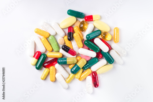 Pile of colored pills isolated