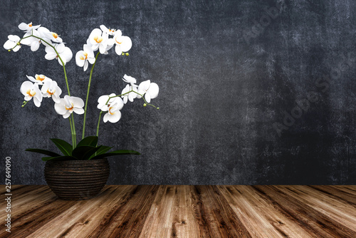 Fototapeta Naklejka Na Ścianę i Meble -  Wooden floor board or table on chalk background with orchid flower