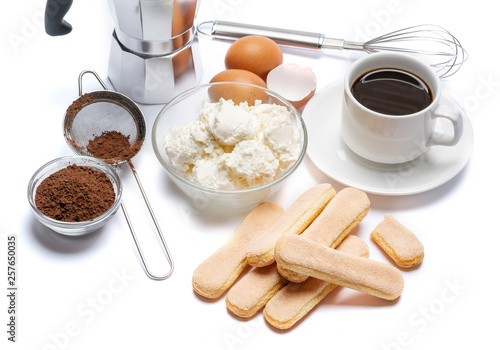 Ingredients for cooking tiramisu - Savoiardi biscuit cookies, mascarpone, cream, sugar, cocoa, coffee and egg
