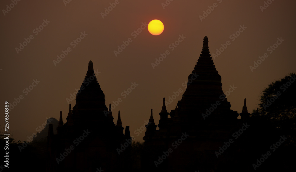 Silhouette of some of the many temples in Bagan (formerly Pagan) during sunset. Archaeological Zone is a main attraction in Myanmar and over 2,200 temples and pagodas still survive today.