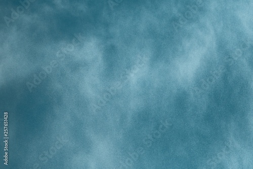light blue water dust in the air close-up texture - fantastic abstract photo background