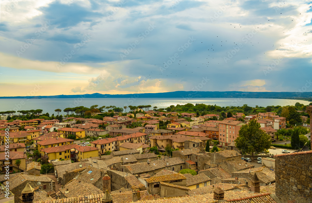 Bolsena, Provincia di Viterbo, Italy. Top view of the roof and the lake.