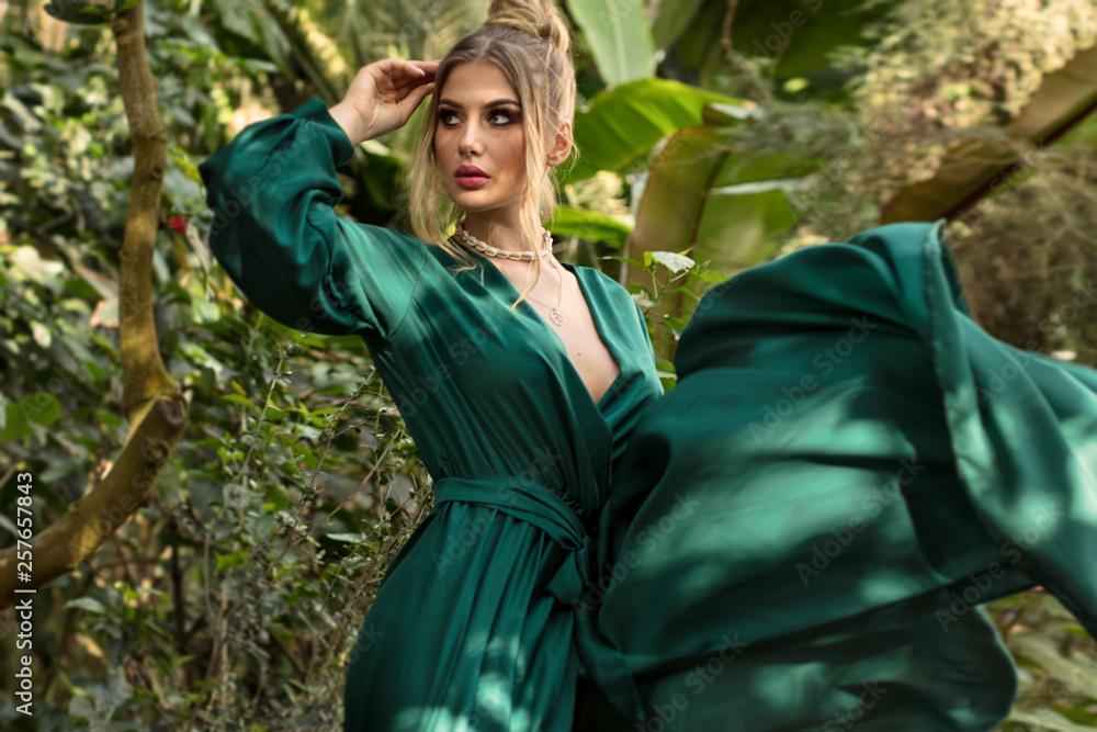 Fototapeta premium Sensual girl in tropical garden.