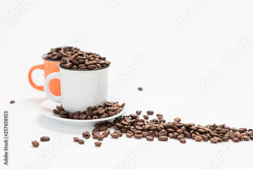 Coffee Cups Filled with Coffee Beans on a White Background Concept with Copy Space