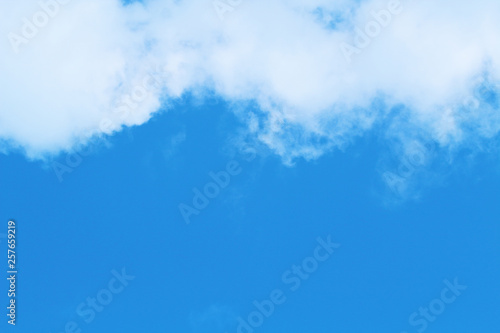 Blue sky and cumulus clouds. Background. Texture.