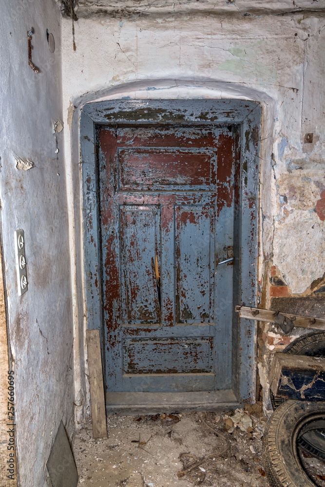 old aged door in an abandoned house