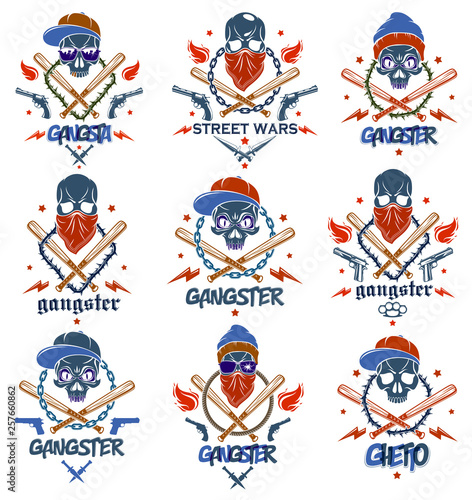Gangster emblem logo or tattoo with aggressive skull baseball bats and other weapons and design elements, vector set, criminal ghetto vintage style, gangster anarchy or mafia theme. © Sylverarts