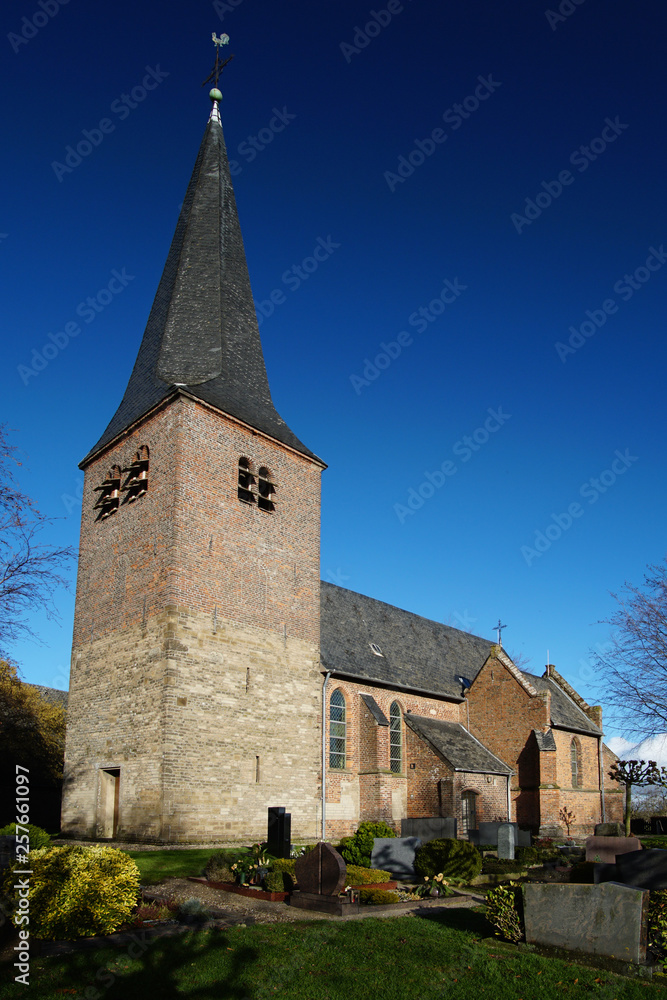St. Antonius church in Kalkar Hanselaer, Germany on a sunny day