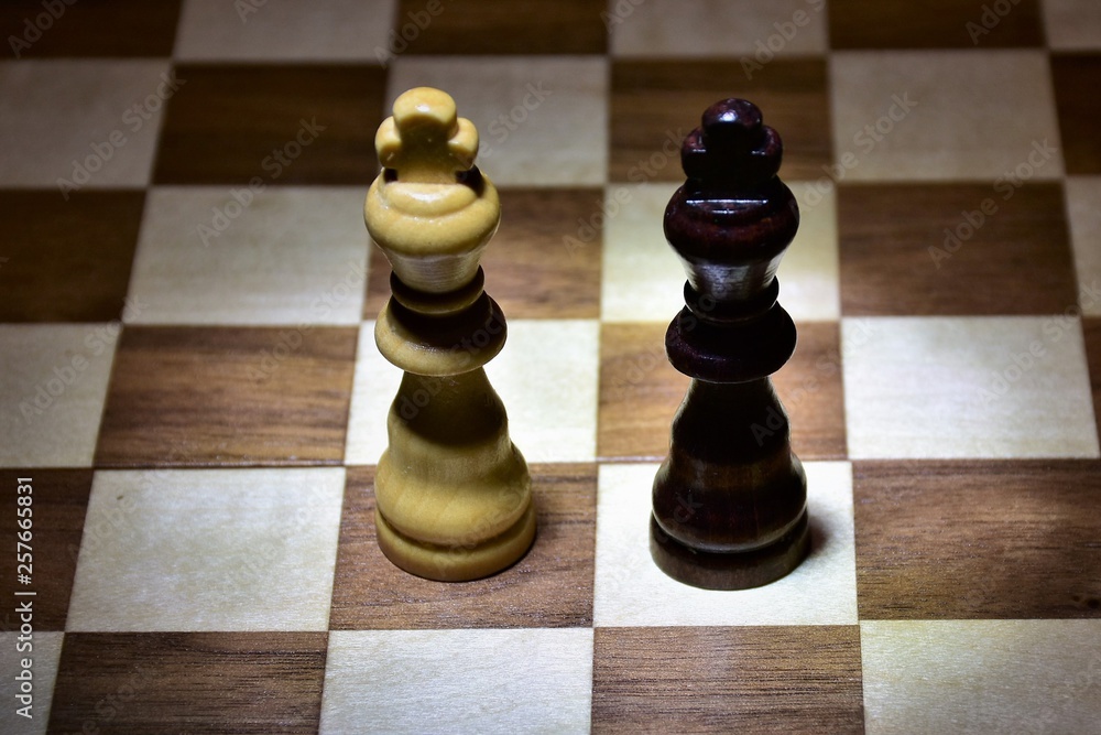 confrontation of two opponents on a chessboard confrontation of two opponents on a chessboard