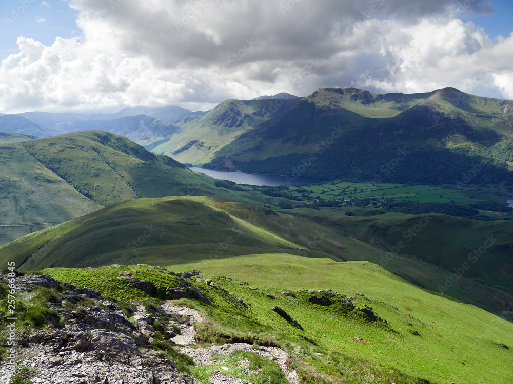 Summits of High Crag, High Stile and Red Pike above Buttermere from below Whitless Pike on a sunny day in the English Lake District, UK.