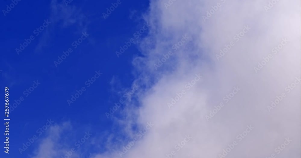 White clouds on a blue sky background White clouds on a blue sky background