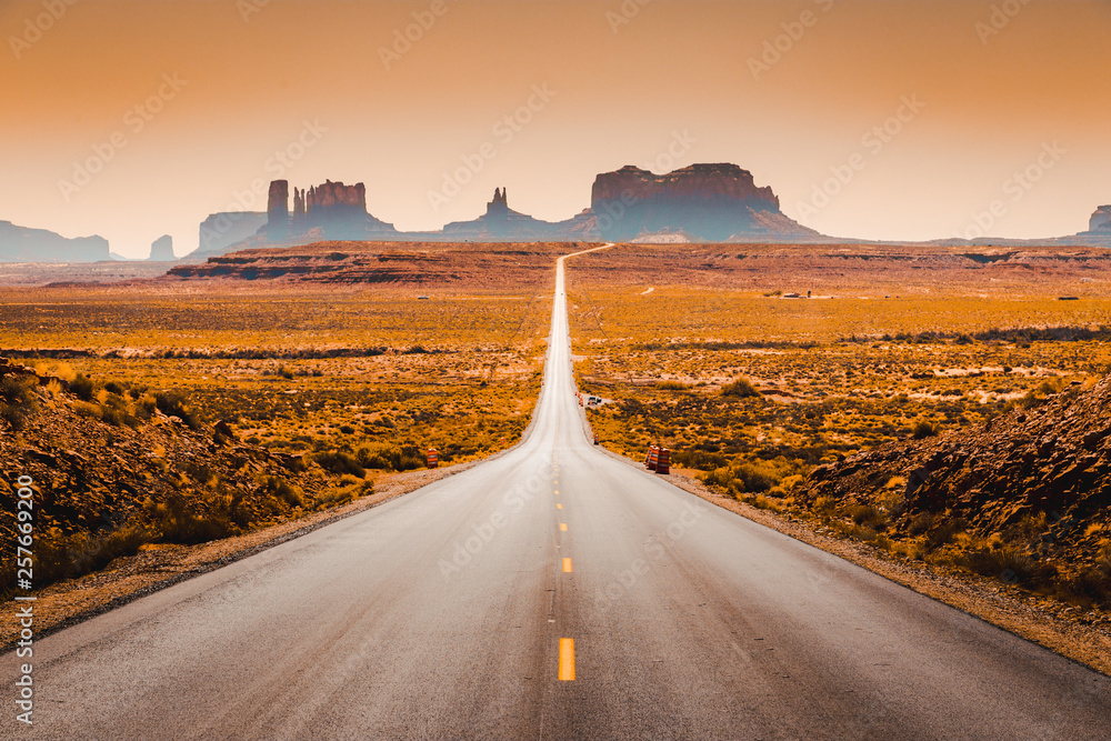 Classic highway view in Monument Valley at sunset, USA