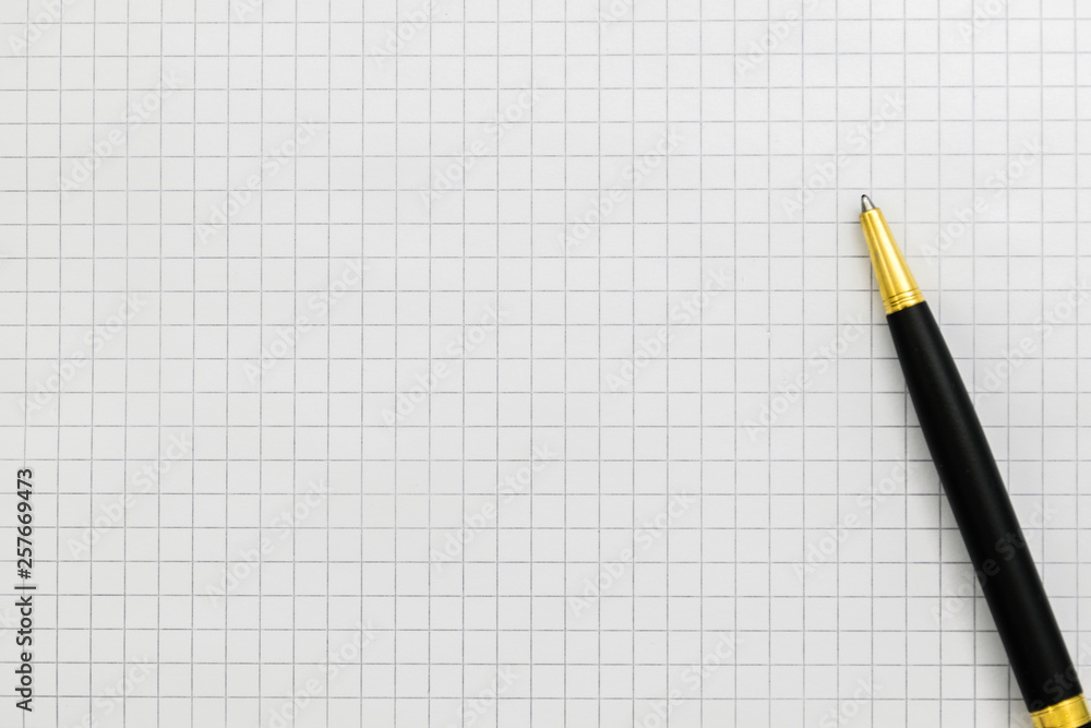 black pen on open notebook close-up, copy space. black pen on open notebook close-up, copy space.