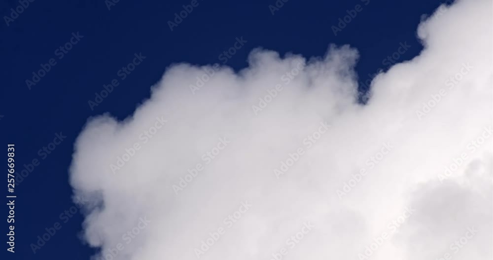 White clouds on a blue sky background White clouds on a blue sky background