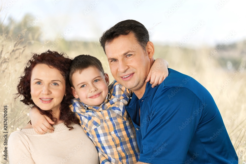 Lovely family in park outdoor Lovely family in park outdoor