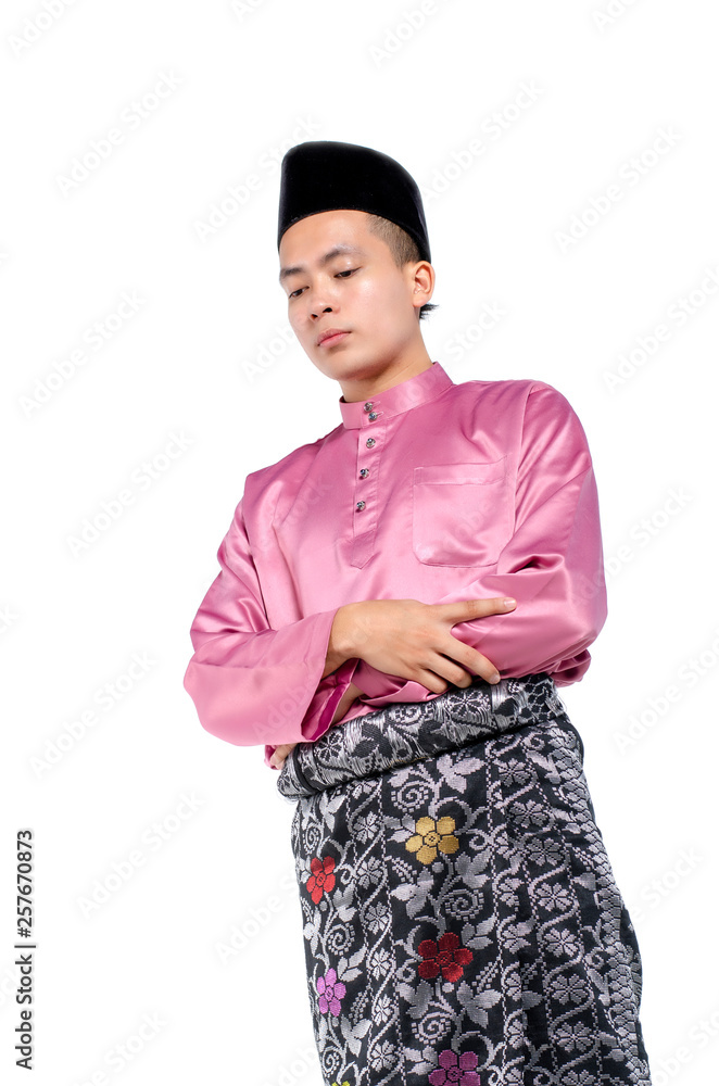 Portrait of young and handsome asian man with traditional praying over white background