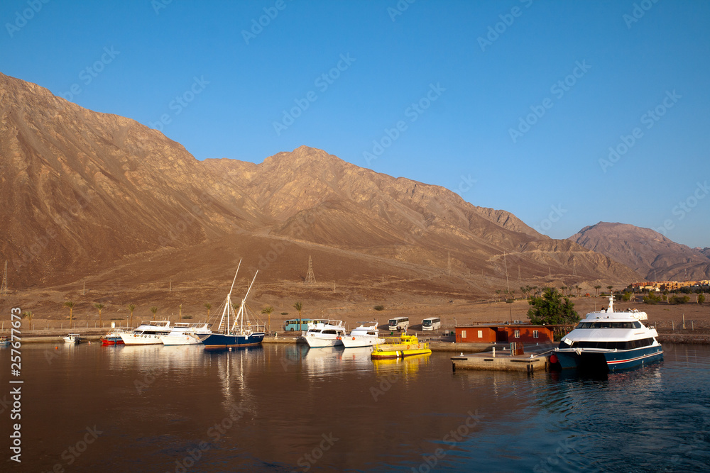 Boats and yachts are in the harbor. Taba, Egypt