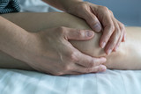Knee pain disease concept. Hands on leg as hurt from Arthritis, gout or infections.