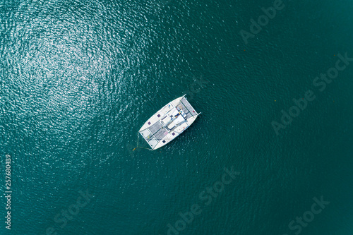 Top view aerial drone shot of sailing boats in tropical sea © panya99
