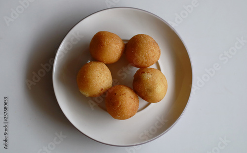 Indonesian Traditional Fritters  Misro.  Made from deep fried cassava and filled with palm sugar.