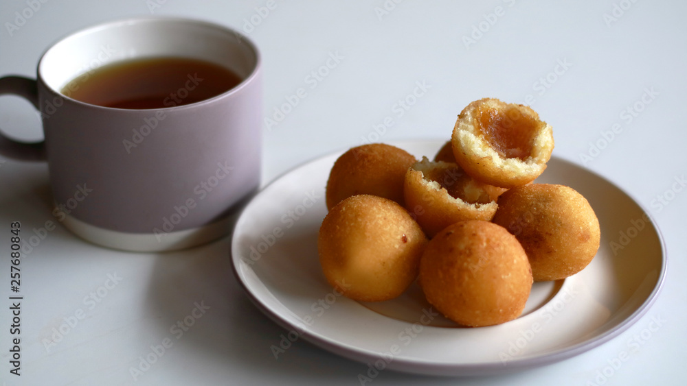 Misro, Indonesian Traditional Fritters, and a cup of tea. Misro, Indonesian Traditional Fritters, and a cup of tea.
