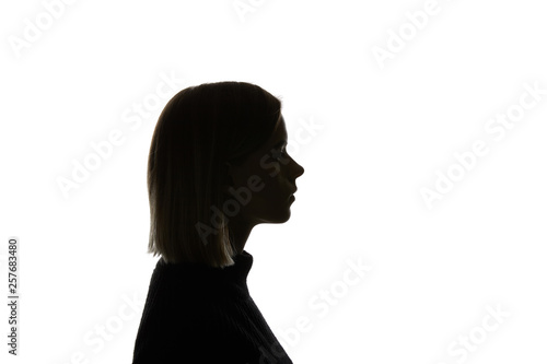 Side view of woman with straight hair isolated on white