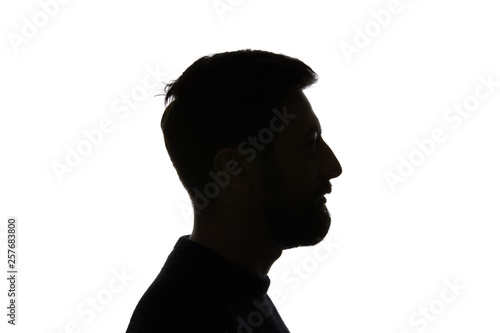 Side view of man looking away isolated on white