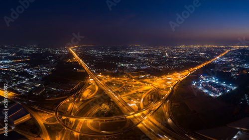 Aerial view. Traffic of expressways, motorways and highways at night