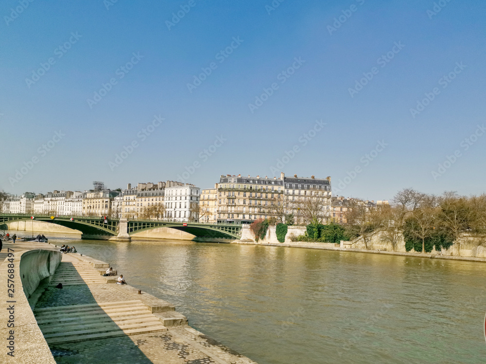 PARIS, FRANCE - MARCH 22, 2019: Scenery on the banks of the Seine in Paris