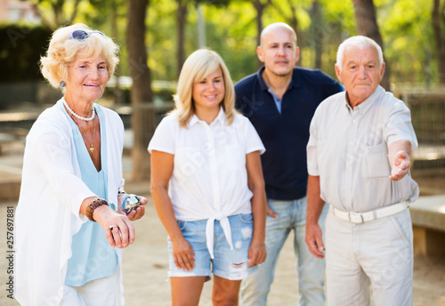 Mature people playing bocce