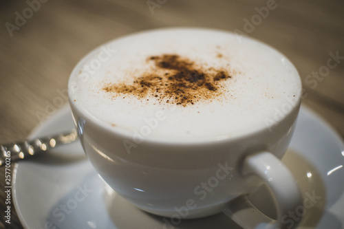 Cup of Coffee with smoke/ Cup of Steamy Coffee with smoke on wooden table - Image