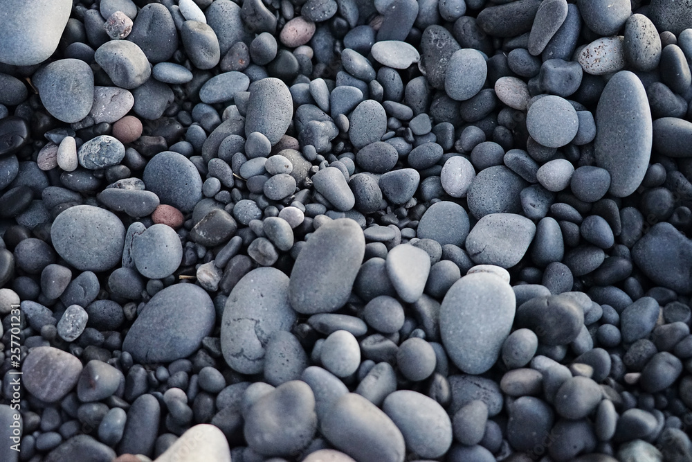 Beach pebbles and sand Beach pebbles and sand