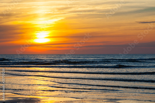 Golden sunset over a beach of the north sea