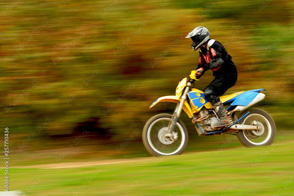 Motocross Action in Autumn