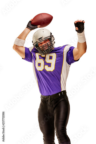 Football Player in action with ball in the hand isolated on white background. © Georgii