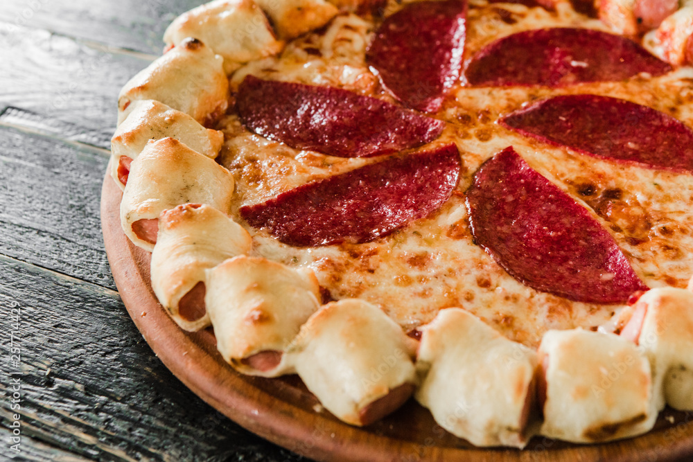 tasty unusual pizza with sausage in a side tasty unusual pizza with sausage in a side