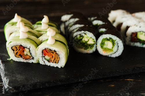 rolls with fresh fish, vegetables and cream cheese