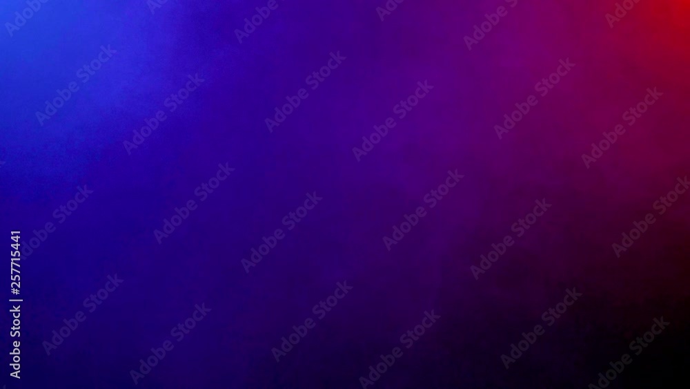 Smoke lighten by blue and red lights on black background. Abstract colored background of smoke spreading. Smoke lighten by blue and red lights on black background. Abstract colored background of smoke spreading.