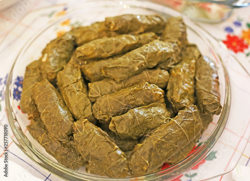 rice wrapped in grape leaves - traditional greek food called dolmadakia - green vine leaves with rice photo