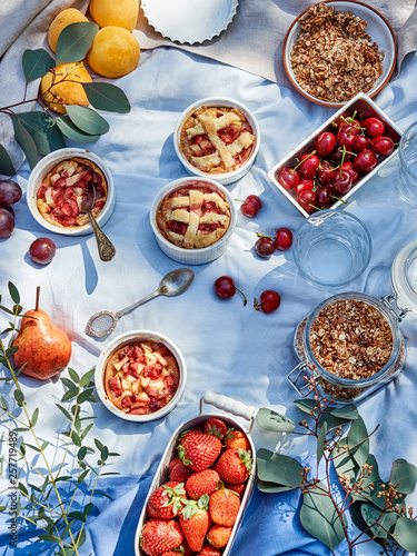    Picnic table with different choices of dessets photo