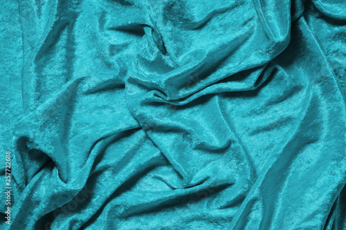 cyan blue or turquoise panne velvet drape background texture