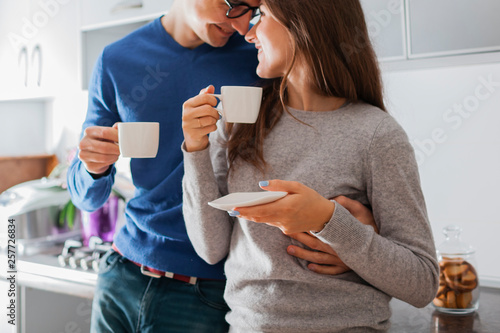 Cute elderly couple in kitchen photo