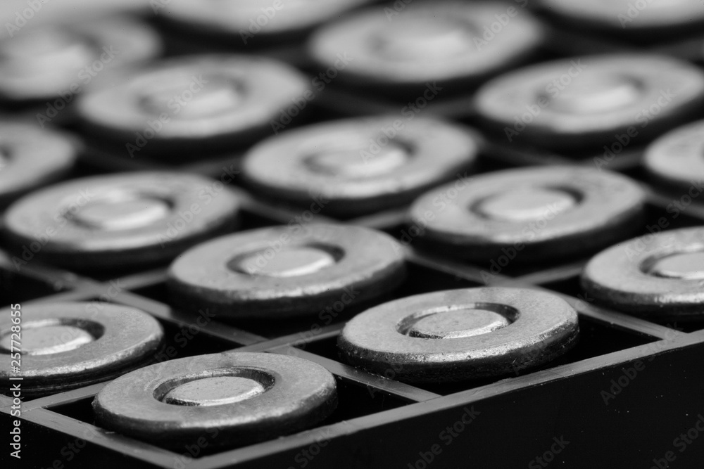 Pile of pistol bullets. The concept of limiting the spread of small arms. Black and white image Pile of pistol bullets. The concept of limiting the spread of small arms. Black and white image