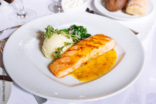 Grilled Salmon Steak with Spinach,Mash potato, souse