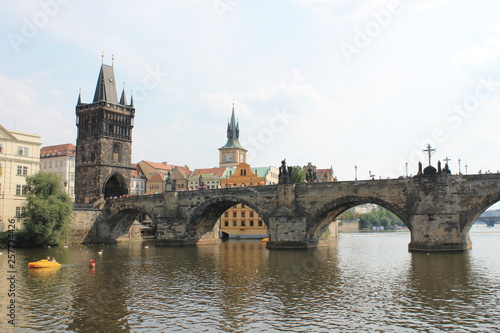 View of Charles bridge in Prague from the Vltava river