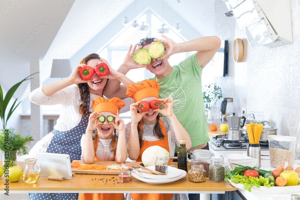 Family cooking in the kitchen at home
