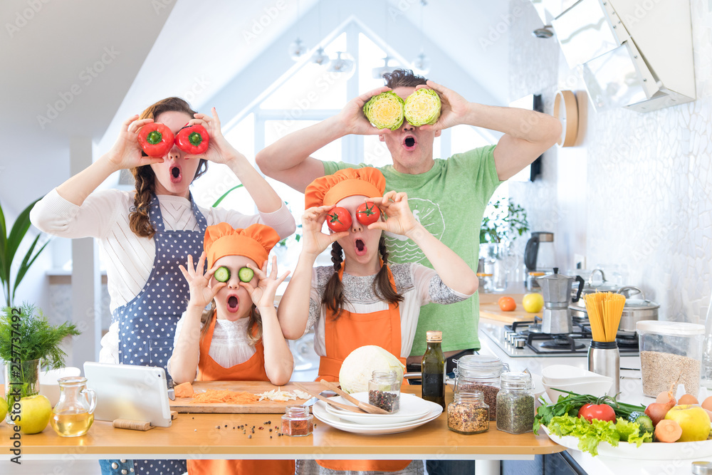 Family cooking in the kitchen at home